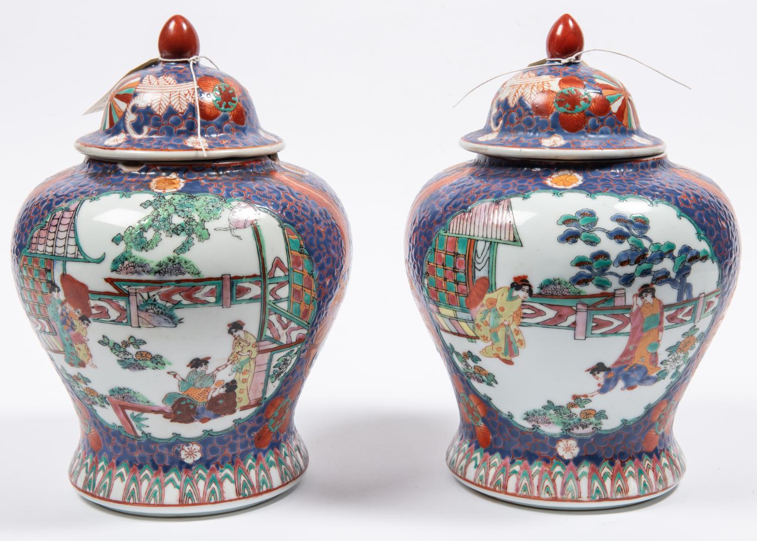 A pair of Chinese ginger jars, 10½" of pottery with lids, colourfully decorated. GC (inner rims - Image 4 of 5