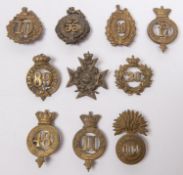 Nine restrike pre 1881 numbered glengarry badges, and another. GC (10) £60-80