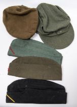 A field grey Third Reich style cap, a dark blue German FS cap, both replicas; 2 other FS caps and