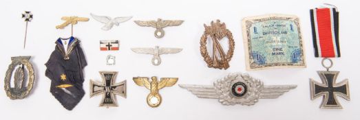 Third Reich badges: 4 cap eagles, 2 breast badges, 2 Iron Crosses, 5 other items, mostly old