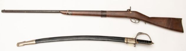 A crude Indian tourist percussion musket, 53" overall; and a modern Indian sword, the blade etched
