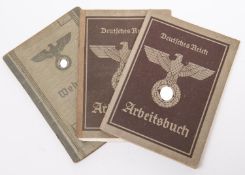 A Third Reich Wehrpass, two similar Arbeitsbuch, and a Dienstausweis. GC £30-50