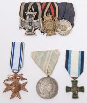 German WWI medal trio: 1914 Iron Cross 2nd Class, 1914-18 Honour Cross, and nine years service
