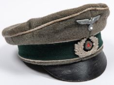 A well made copy of a Third Reich infantry officer's peaked cap, field grey with alloy badges. GC £
