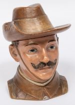 A painted earthenware tobacco jar, in the form of the head and shoulders of a Boer War period City