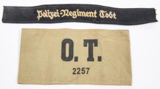 A Third Reich cuff title, Polizei Regiment Todt, also a printed khaki armband "O.T. 2257", GC (the