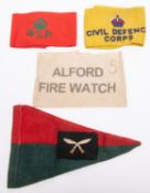 A red over green triangular car pennant, mounted on each side with embroidered patch of the 43rd