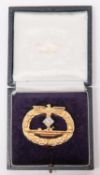 A good post war copy of a Third Reich U Boat badge with diamonds, in its case. VGC £200-250