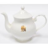 A Third Reich china teapot and lid, marked with a gilt eagle and swastika flanked by "AH", made by