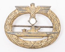 A Third Reich U boat badge by Friedrich Orth, Wien, gold washed with horizontal round pin, the