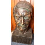 A large bronze head of Adolf Hitler, mounted on a rectangular marble plinth, overall height 26",