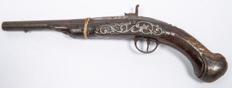 A relic late 17th century 30 bore holster pistol converted to percussion, the three stage barrel