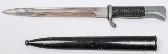 A Third Reich period parade bayonet, plated blade 9½" etched "Fur Erinnerung an meine Dienstzeit",