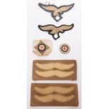 Third Reich cloth items: two Luftwaffe embroidered breast eagles; two felt rank emblems from