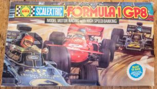 A large quantity of Scalextric with boxed sets and accessories. Including 3x sets; a Formula 1 GP8