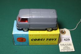 A Corgi Toys Commer 3/4 Ton Chassis Van. In dark grey with red interior and Whizzwheels style
