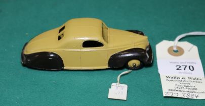 Dinky Toys Lincoln Zephyr (39cu). A U.S. export issue in tan with dark brown wings, ridged tan