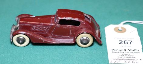 Dinky Toys Super Streamlined Saloon (24e). A 1935-1936 example in maroon with maroon 'criss-cross'