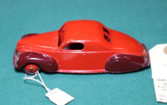 Dinky Toys Lincoln Zephyr (39cu). A U.S. export issue in red with maroon wings, ridged red wheels