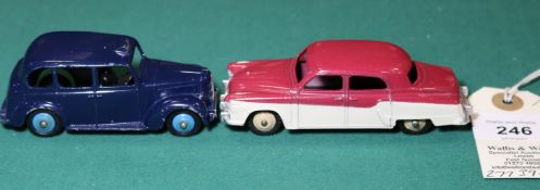2 Dinky Toys. Austin TAXI (40/254). Example in dark blue with mid blue wheels and black rubber
