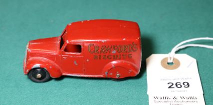 Dinky Toys Type 3 280 Series Delivery Van. An example in deep red with genuine lettering "