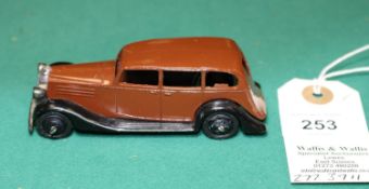 Dinky Toys Vauxhall Car (30d). A 1946-1950 example in dark brown with black closed chassis, black