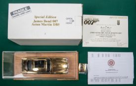 Danbury Mint James Bond Aston Martin ( Gold issue). Comes complete with Certficate and paperwork,