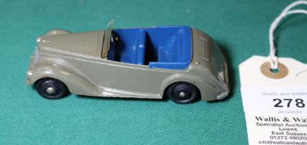 A Dinky Toys Armstrong Siddeley (38e). An example in grey with blue seats. ridged wheels and black