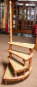 A set of vintage pine library steps with faux leather on each step. Very desirable piece of