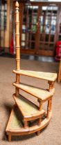 A set of vintage pine library steps with faux leather on each step. Very desirable piece of