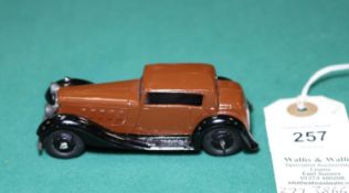 Dinky Toys Humber Vogue (36c). A Post War example in dark brown with black moulded chassis, black