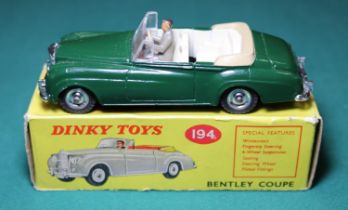 Dinky Toys Bentley Coupe (194). A rare, possibly unique example in dark green with cream interior