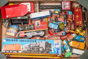 30+ Mainly tin plate and plastic toys, Boxed and loose. To include Helicopters, Trains, Cars, Triang