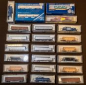 A quantity of 'N' gauge Freight Rolling Stock by KATO, Tomix and Trix. 3x Bogie Tank Wagons. 9x