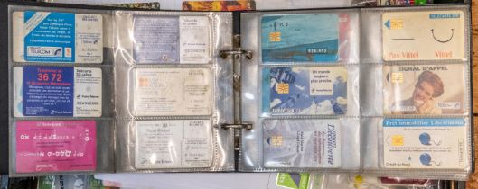 200+ British and Worldwide issue Telephone cards. Used and unused, mint in packets. To include,