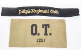 A Third Reich cuff title, Polizei Regiment Todt, also a printed khaki armband "O.T. 2257", GC (the
