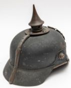A WWI Bavarian pickelhaube, with brass mounts, leather liner, and traces of maker's stamp inside the