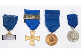 Three Prussian Long Service medals: officer's gilt 15 year cross with F W III bar; 12 years medal;