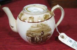 A Grimwade's "Bairnsfather Ware" teapot, decorated with sepia "Old Bill" cartoons, the base