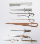 A collection of 8 paper knives, 4 in the form of WWI bayonets, 2 of Imperial German officers'