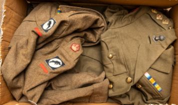 A WWII officer's khaki BD jacket, dated 1940, tailored open lapels; a pair of BD trousers dated
