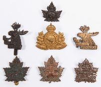 7 WWI CEF Mounted Rifles cap badges: 1st (Tiptaft), 2nd, 3rd, 4th (C.M.R.R., with slider), another