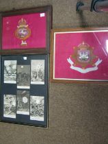 Two embroidered panels depicting the badges of the 8th Hussars and East Surrey Regt, in glazed oak