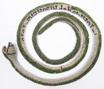 A WWI Turkish Prisoner of War beadwork snake, length over 6 feet extended, covered with green and