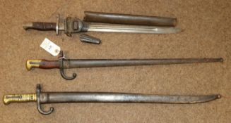 A Gras bayonet, dated 1877; a Chassepot bayonet, both in scabbards (Chassepot seized); also a P17