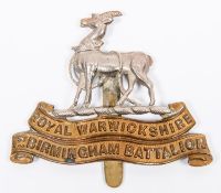 A WWI Kitchener's Army cap badge of the 1st Birmingham Bn The Royal Warwickshire Regiment. GC £150-