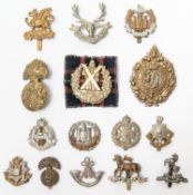 15 Infantry cap badges, including pre 1920 Queens, pre 1935 Northumberland Fusiliers, East Surrey