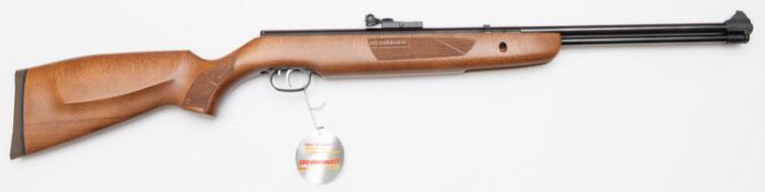 A good .177" Weihrauch HW 57 underlever air rifle, number 2304279, the beech stock having cheek