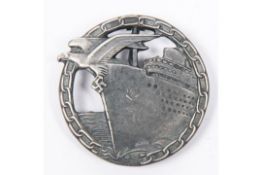 A Third Reich Blockade Breaker's badge, by "Richard Feix, Gablonz, a.d.N.", matt grey with