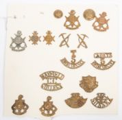 Royal Sussex Regiment: cap badges comprise WWI all brass, (2, one by Smith & Wright), 5th Cinque